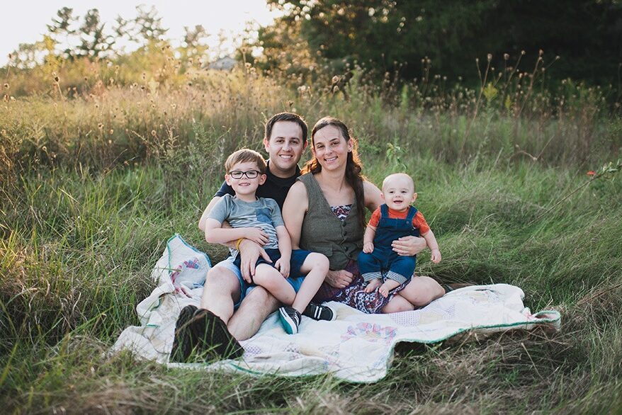 Dr. Weida and his family sitting together outside