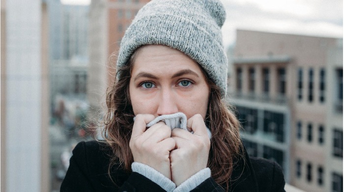 girl with beanie sensitive to the cold