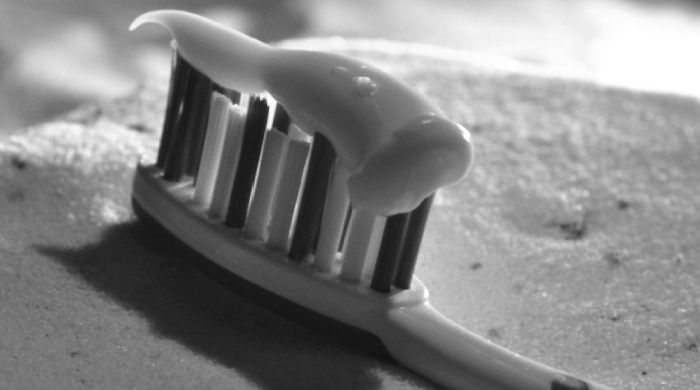 closeup of toothpaste on a toothbrush
