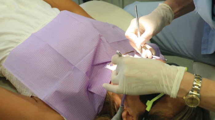 dental patient getting a cavity filled