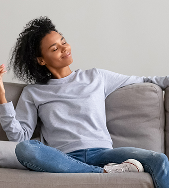 lady relaxing on couch