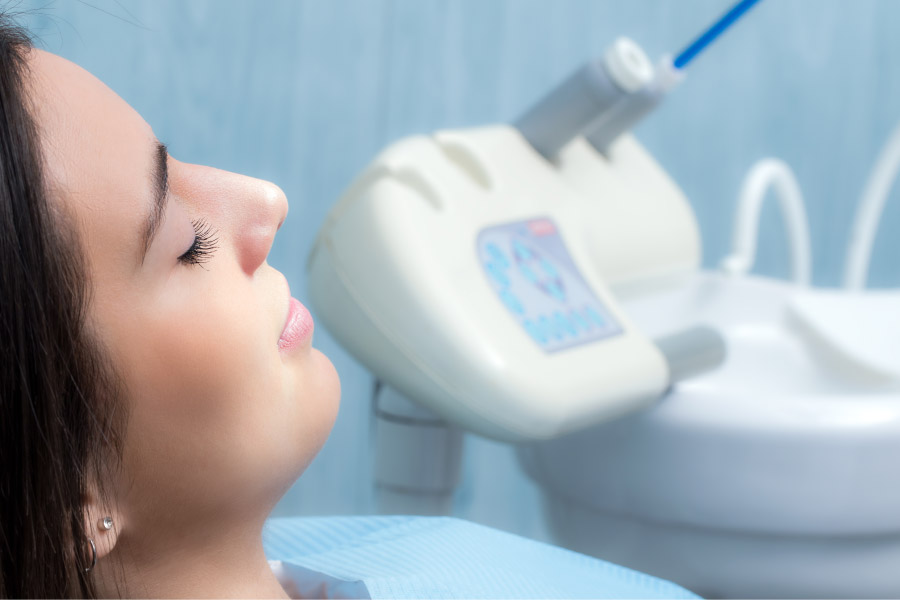 female dental patient undergoing dental sedation to alleviate dental anxiety