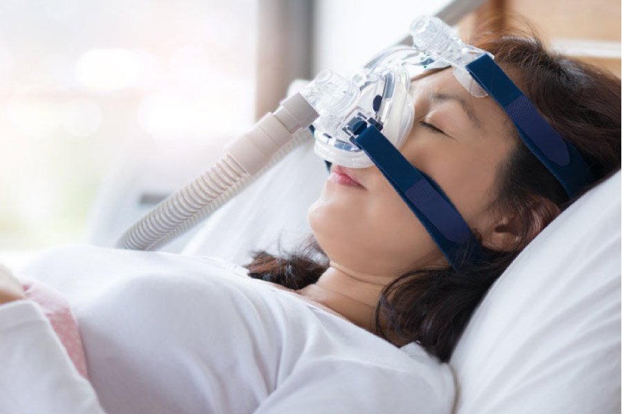 young woman undergoing sedation dentistry for a dental procedure