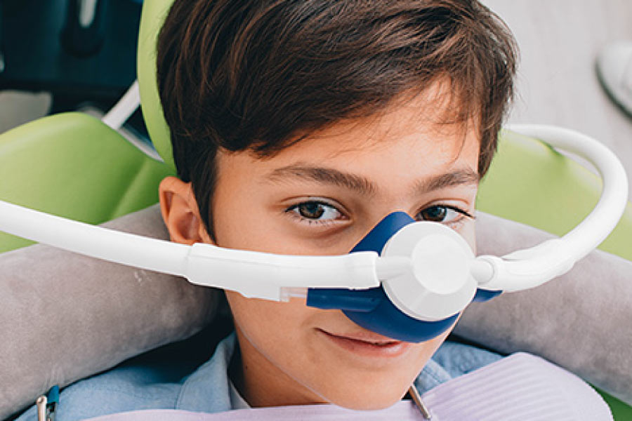 young boy undergoing sedation dentistry at the dental office